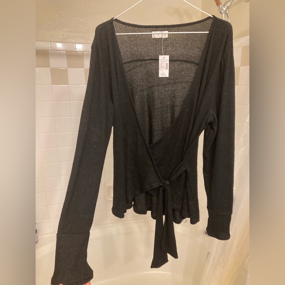 Maurice’s wraparound long sleeve tie front top.